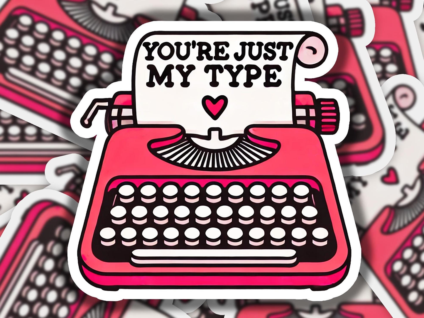 a sticker with a typewriter on it that says you're just my