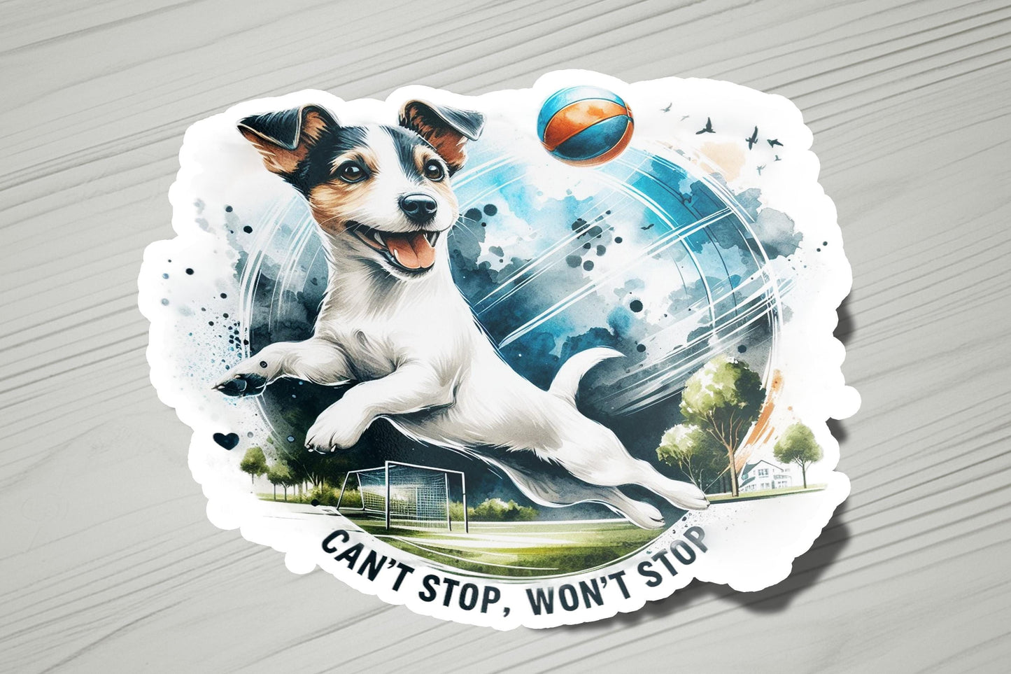 a sticker with a dog catching a ball
