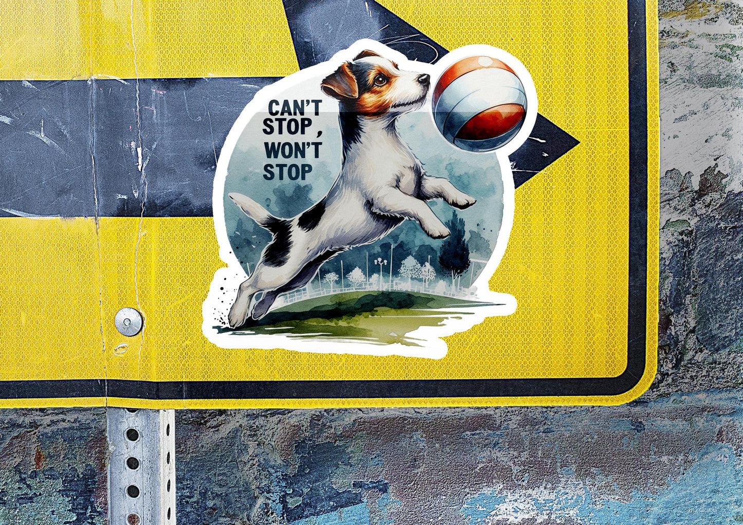 a sticker of a dog catching a ball