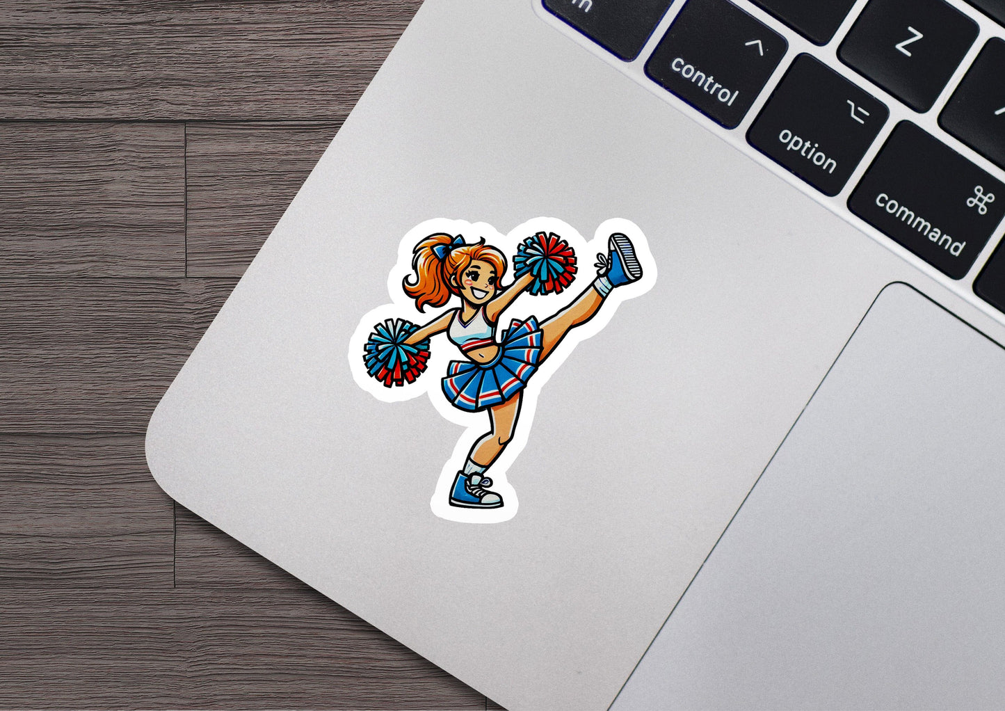a laptop with a sticker of a cheerleader