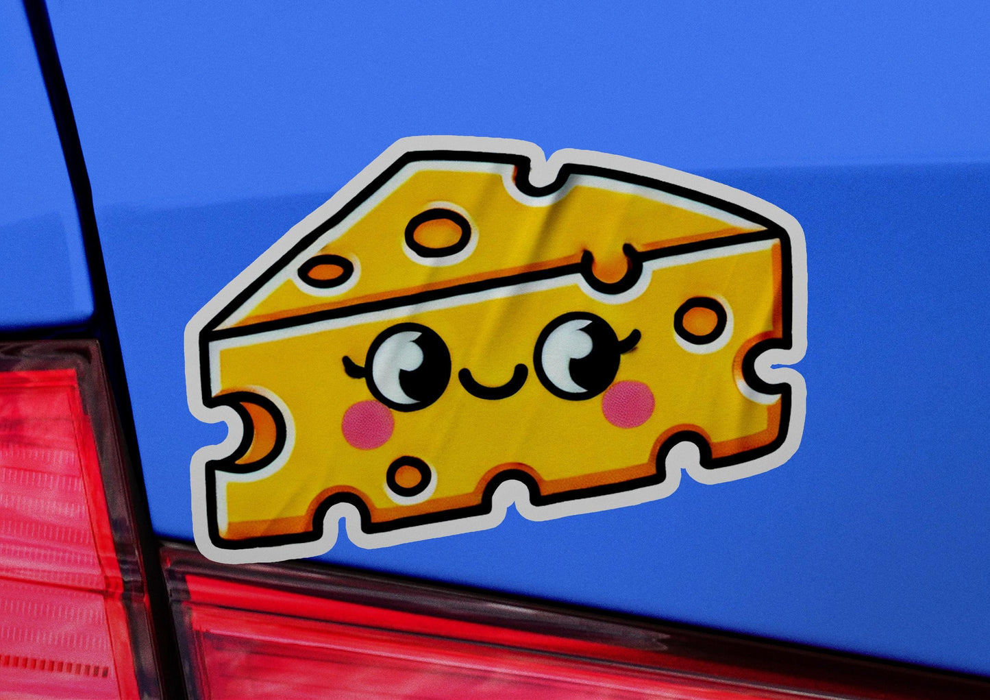 a sticker of a piece of cheese on the back of a car