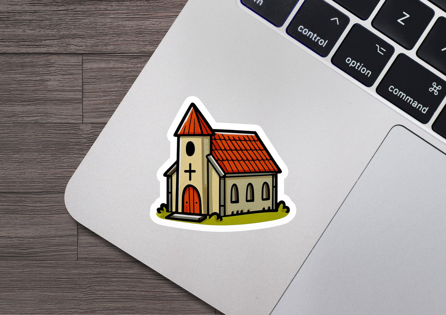 a laptop with a sticker of a church on it