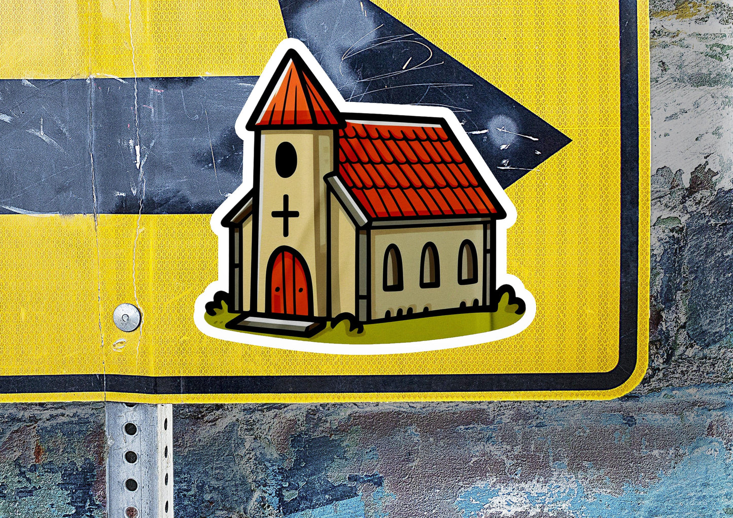 a sticker of a church with a cross on it