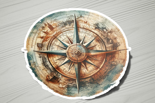 a sticker of a compass on a wooden surface