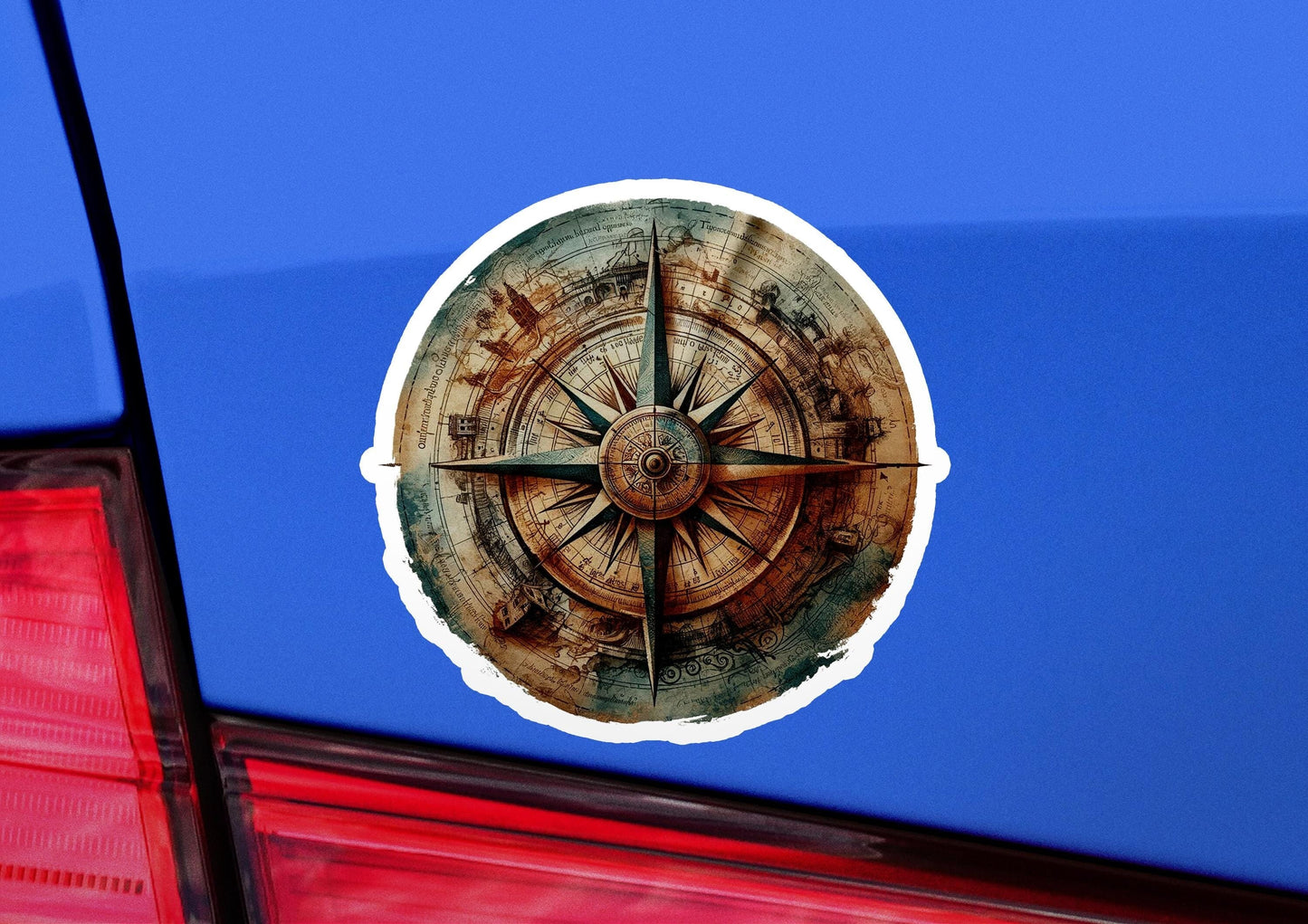 a sticker of a compass on the back of a car