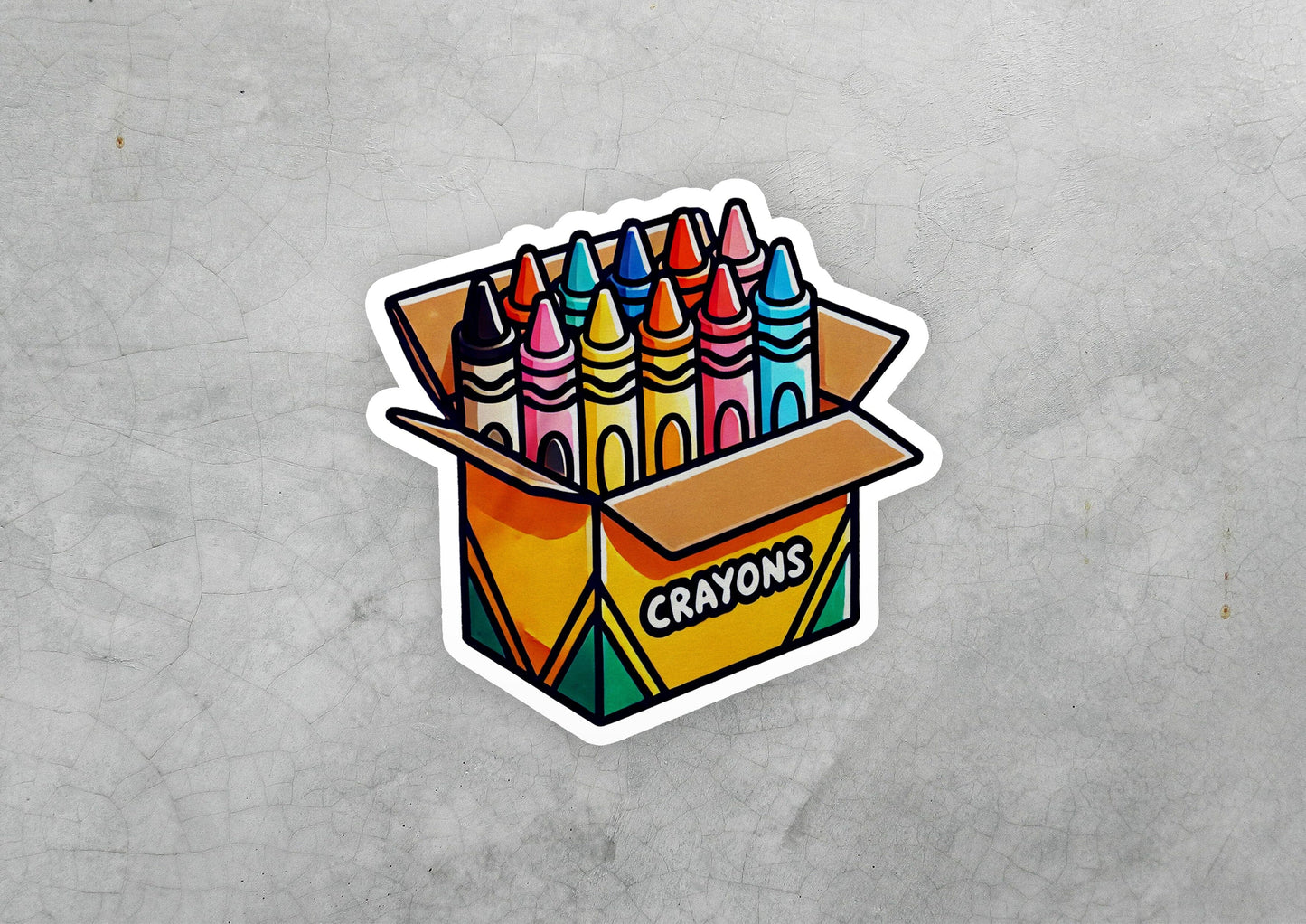 a box of crayons sticker on a concrete surface