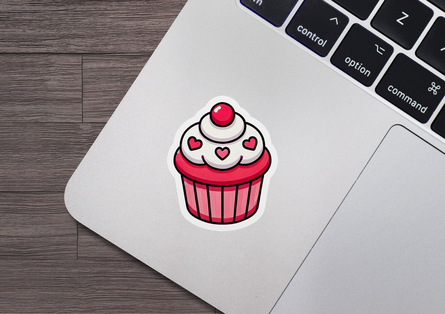 a sticker of a cupcake with a cherry on top