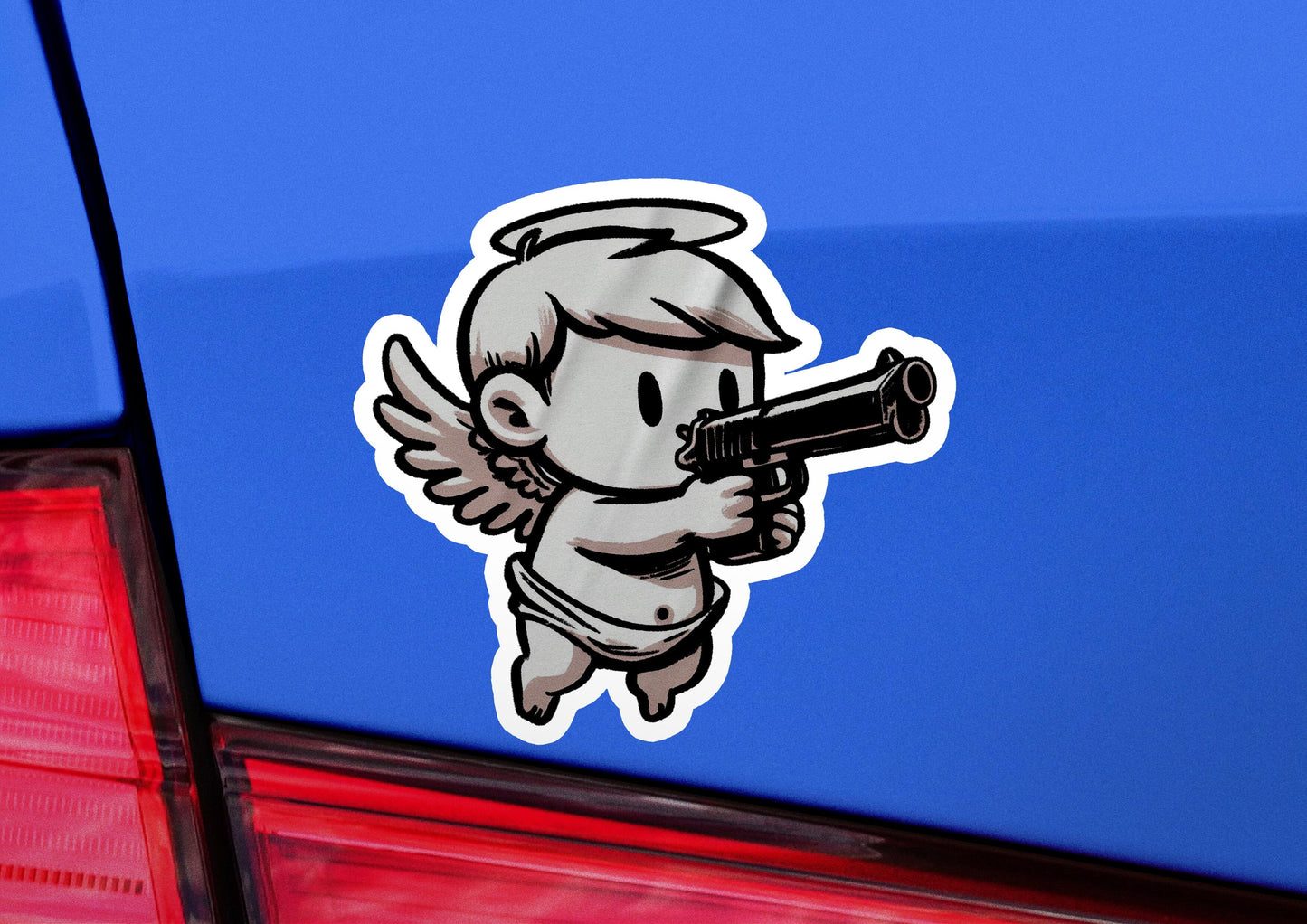 a sticker of an angel holding a gun