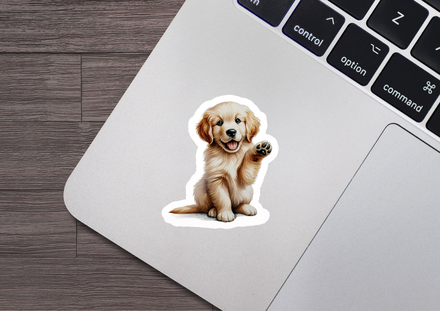 a sticker of a dog sitting on a laptop