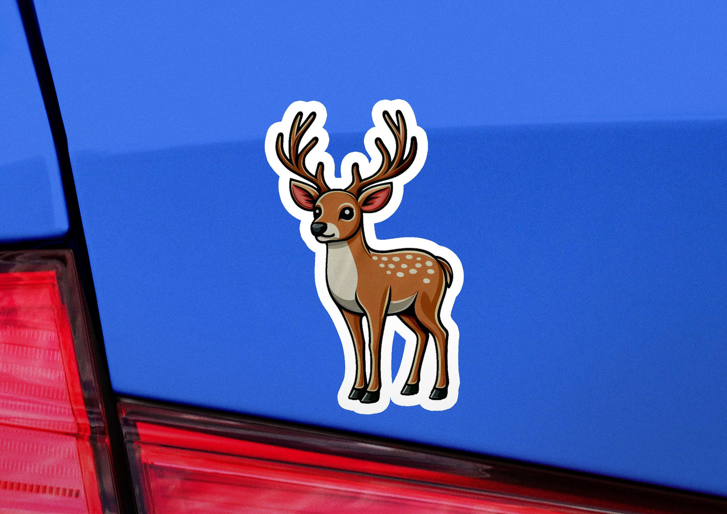 a sticker of a deer on the back of a car