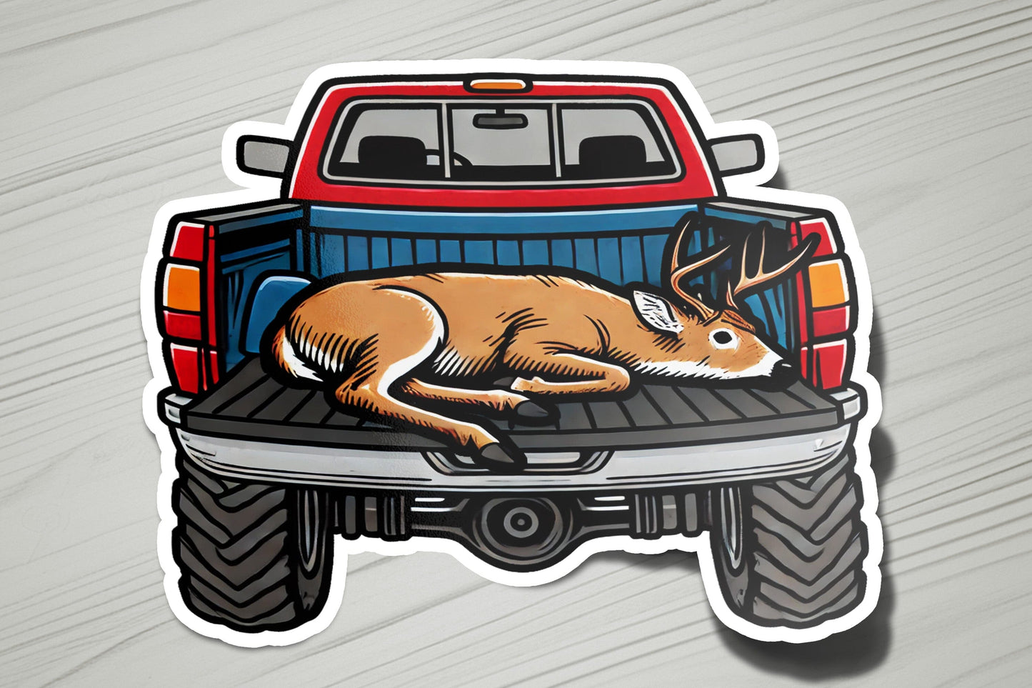a sticker of a deer laying in the bed of a truck