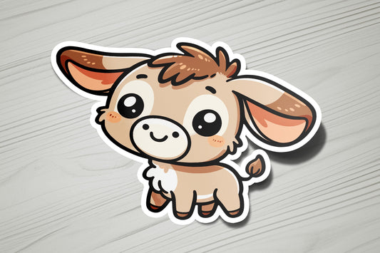 a sticker of a little cow with big eyes