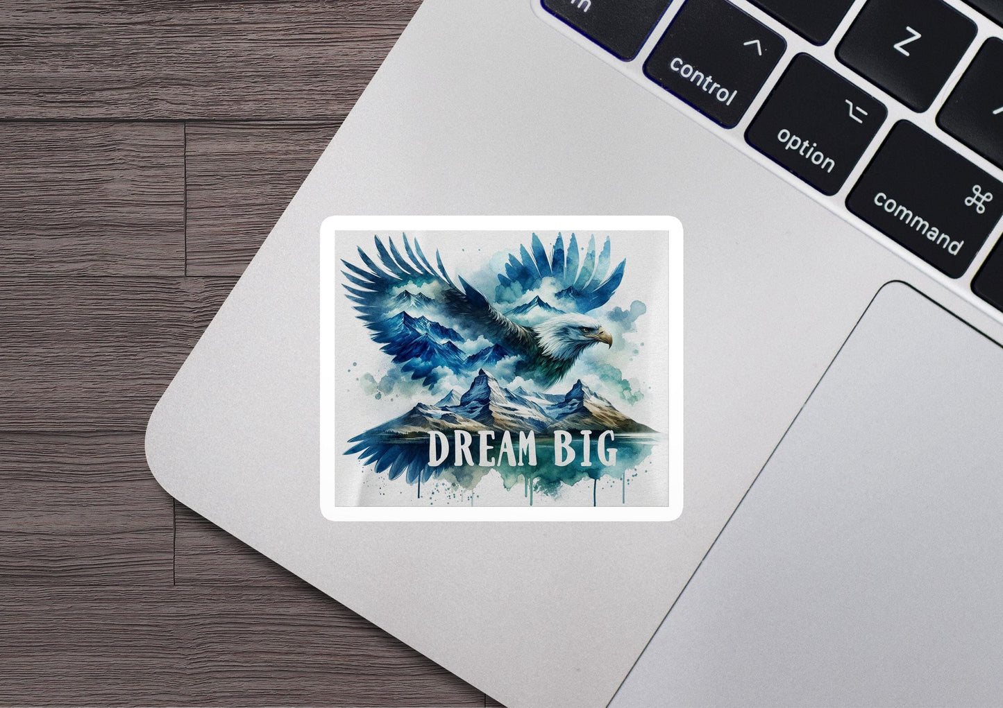 a laptop with a sticker of an eagle on it
