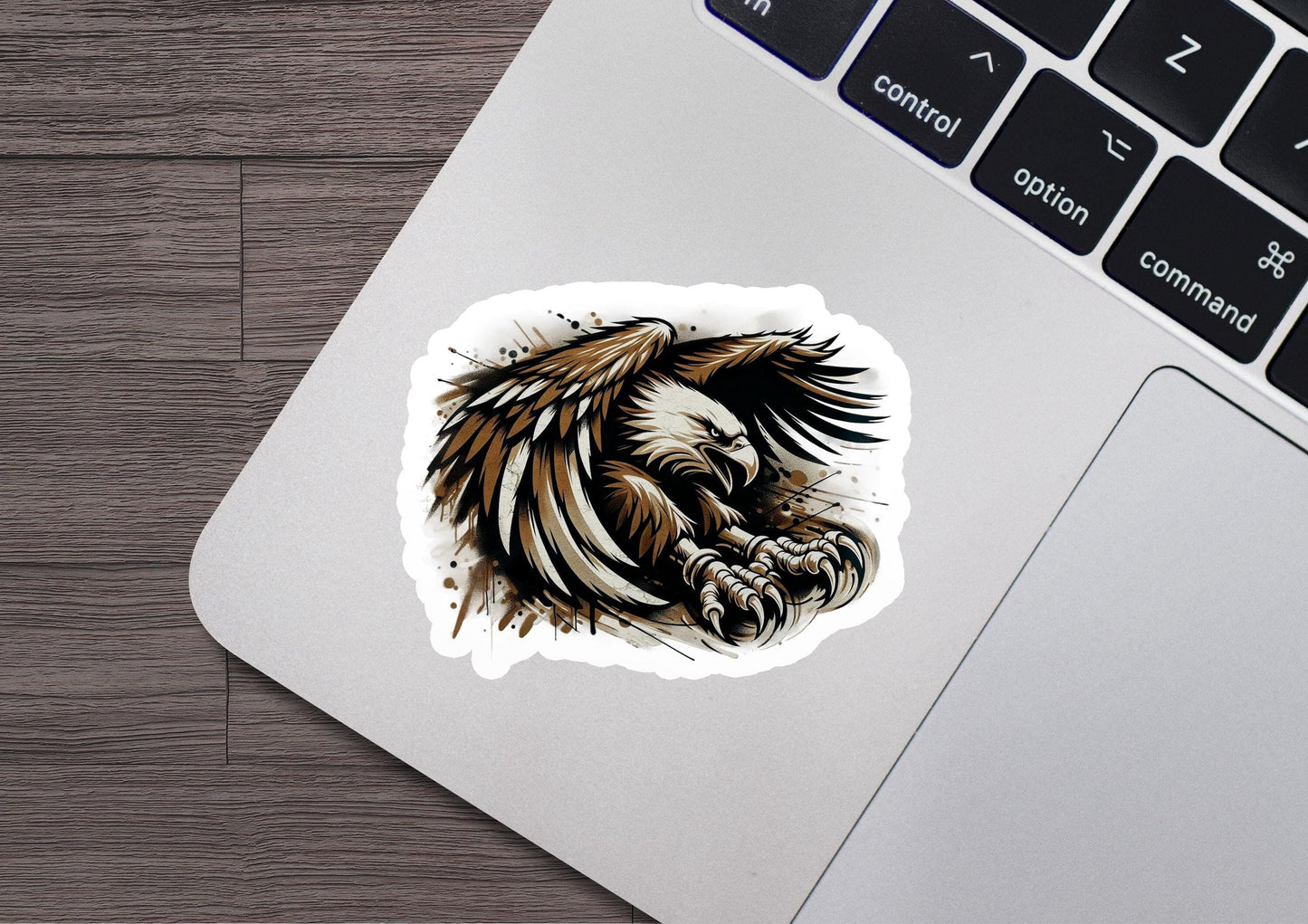 a sticker of an eagle on a laptop