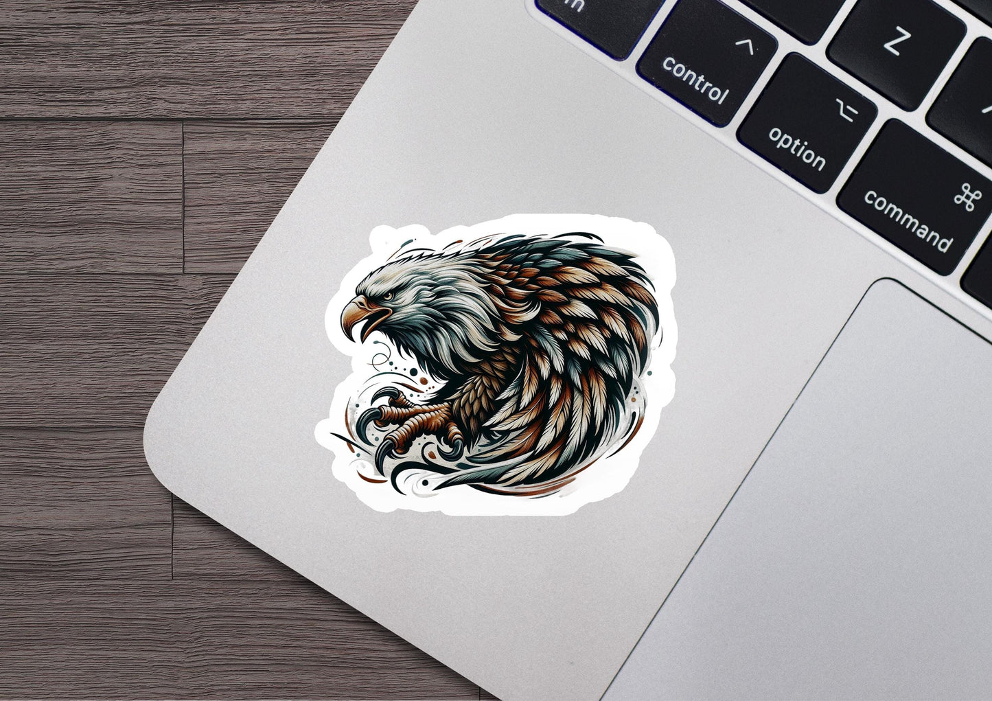 a sticker of an eagle on a laptop