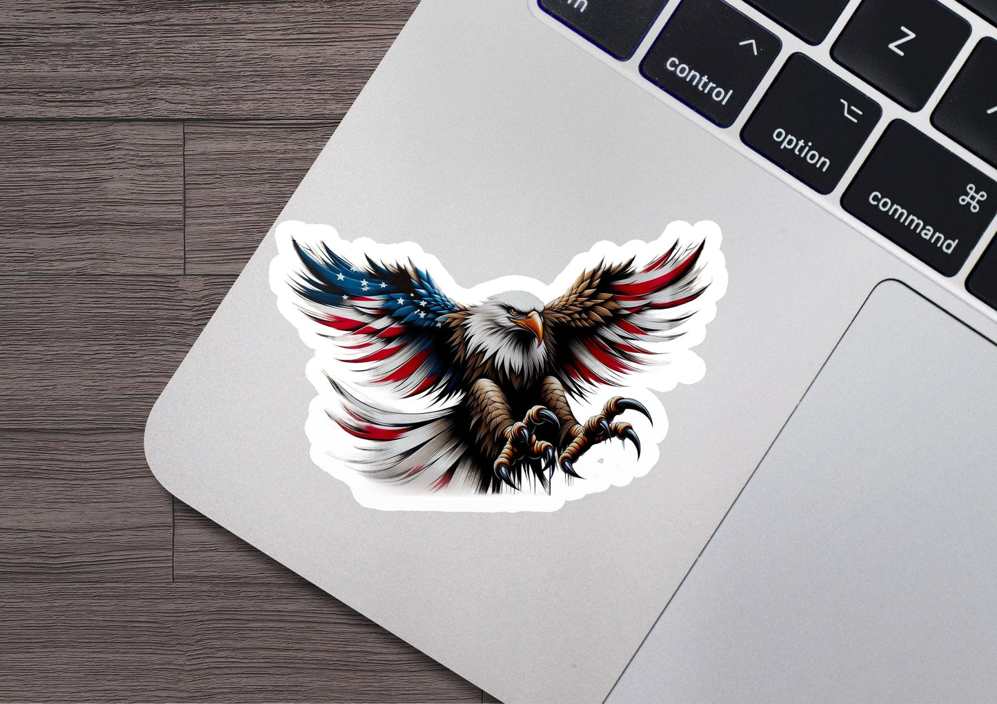 an eagle sticker on a laptop computer