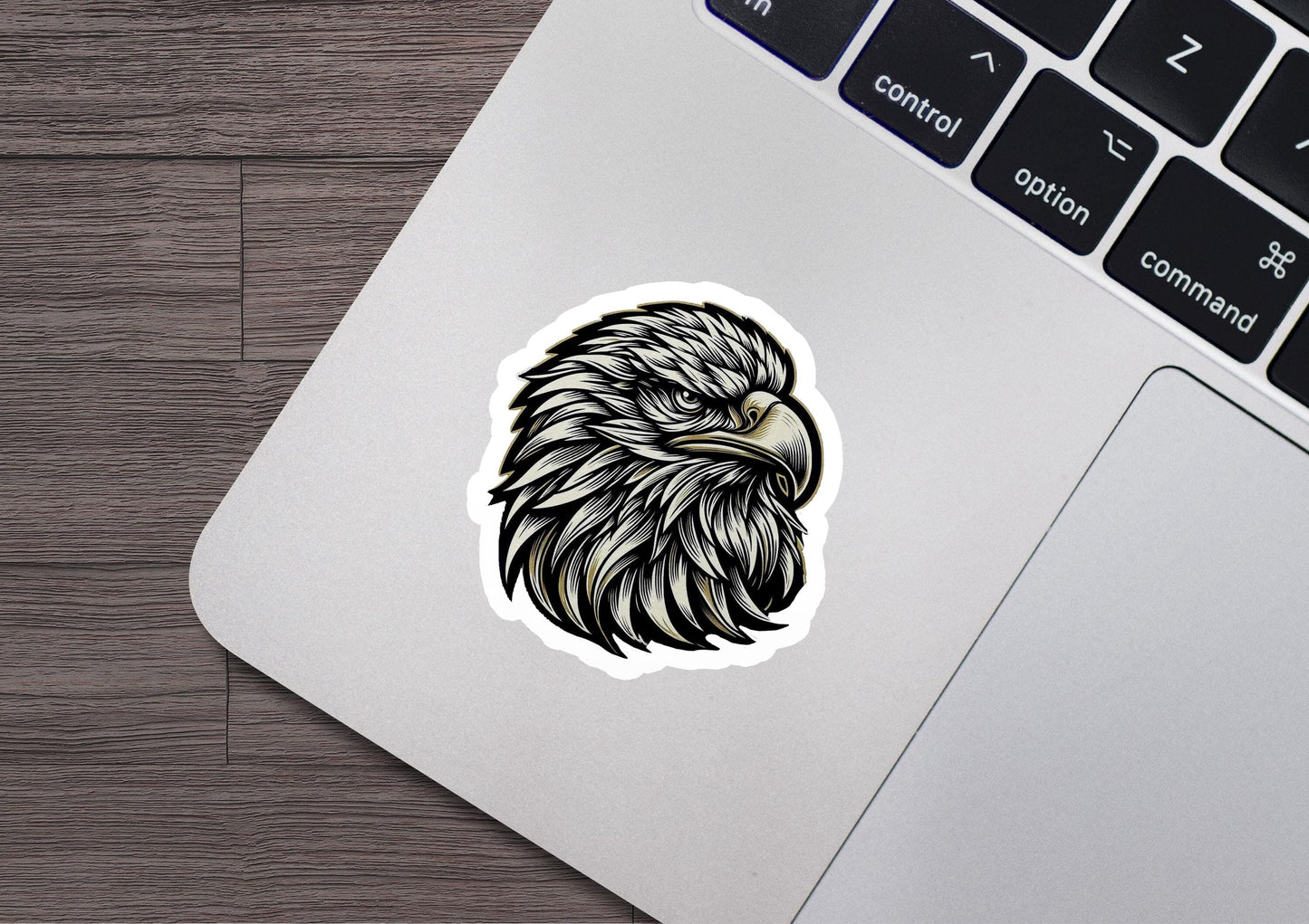 a sticker of an eagle head on a laptop