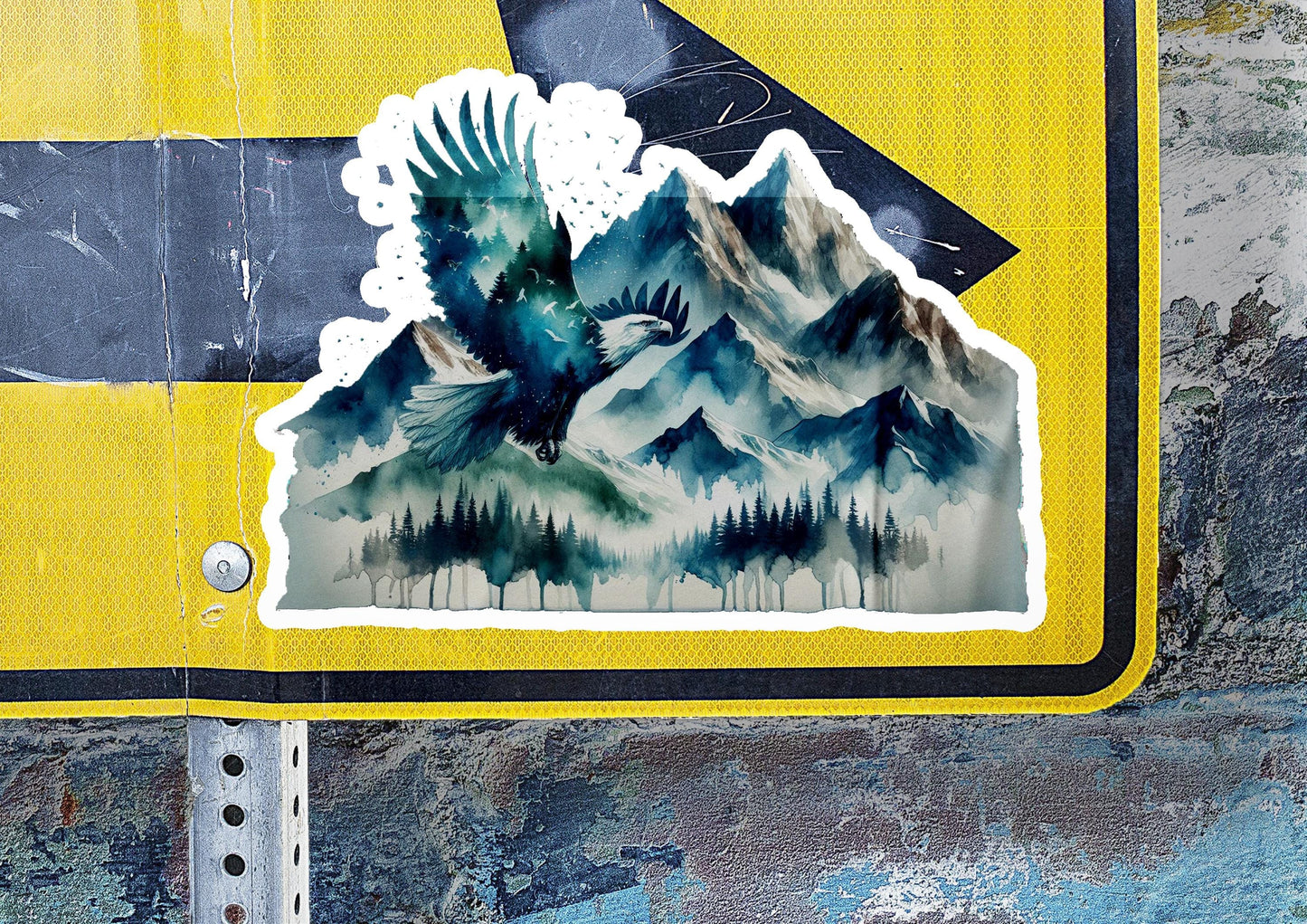 a sticker of a mountain with trees on it