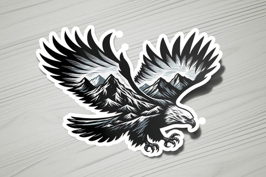 a sticker of an eagle with mountains in the background