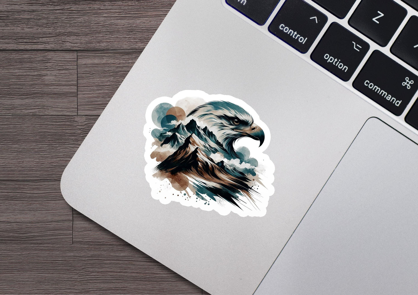 a laptop with a sticker of an eagle on it