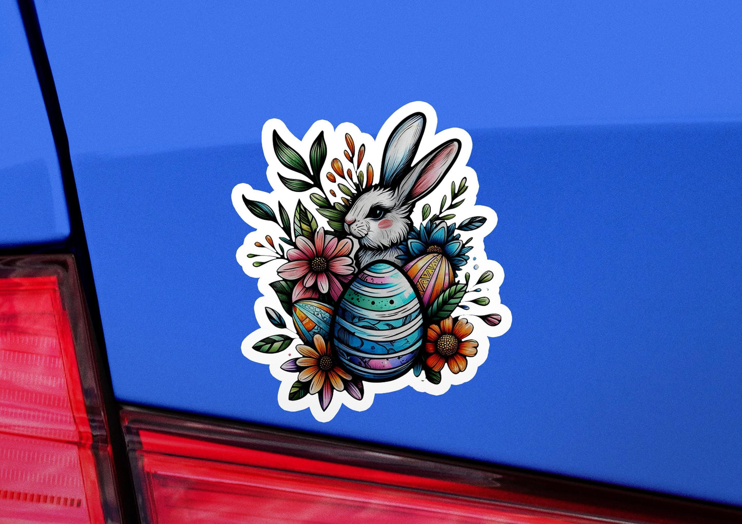 a car with a sticker of a bunny holding an easter egg