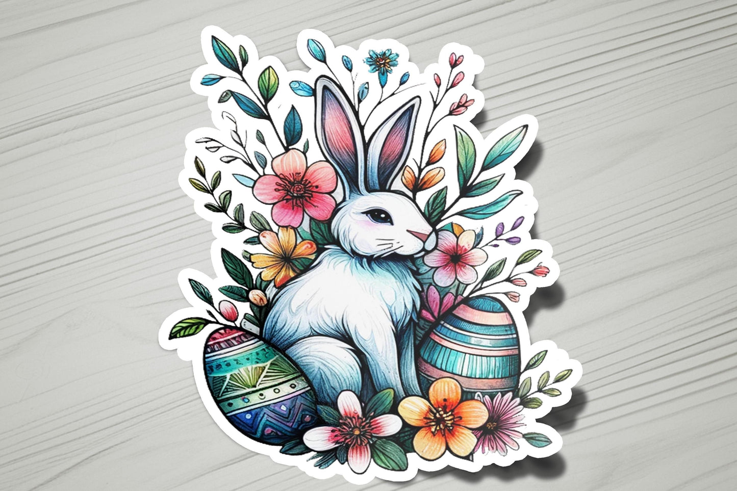 a sticker of a rabbit with flowers and eggs