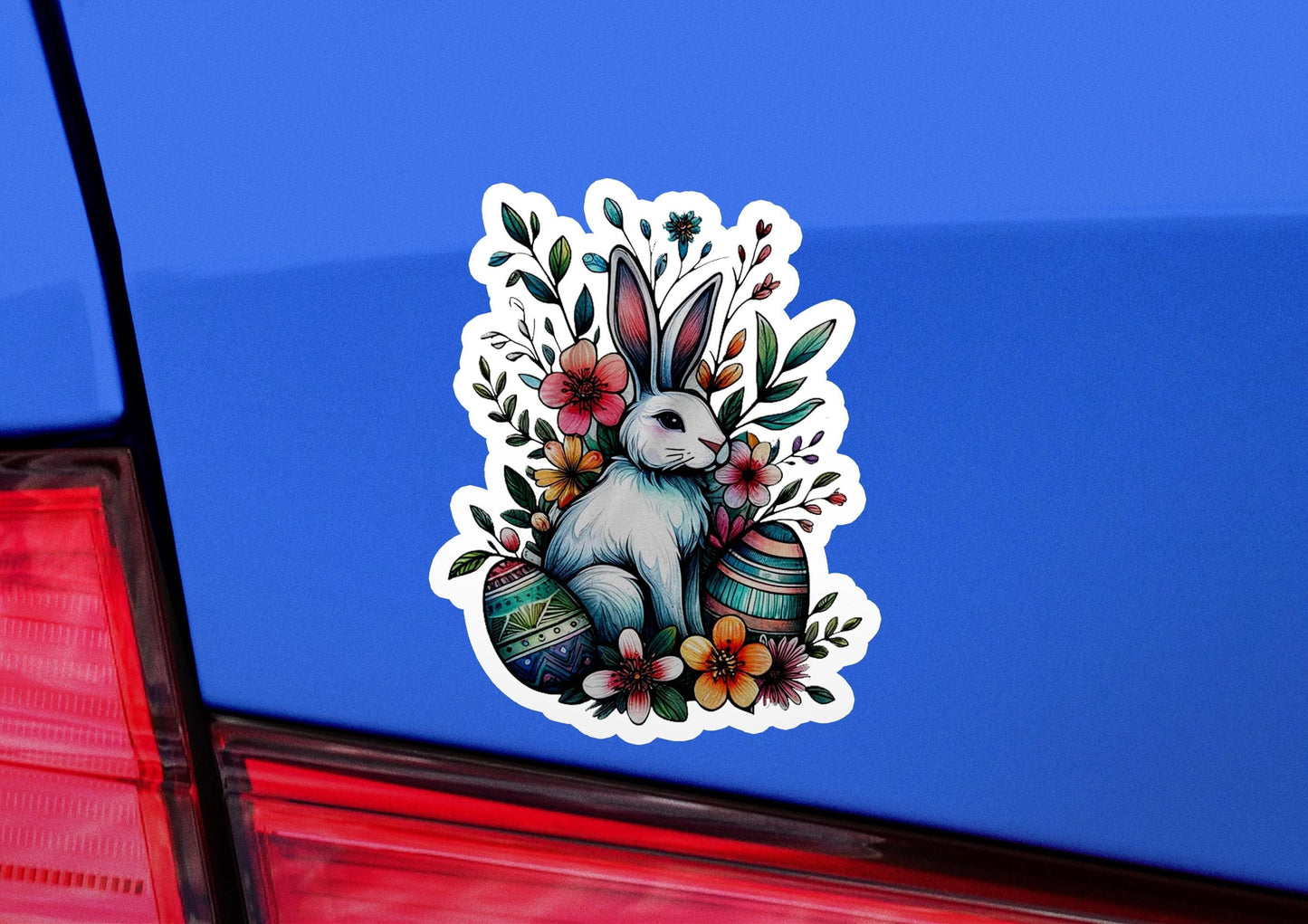 a sticker of a rabbit with flowers on it