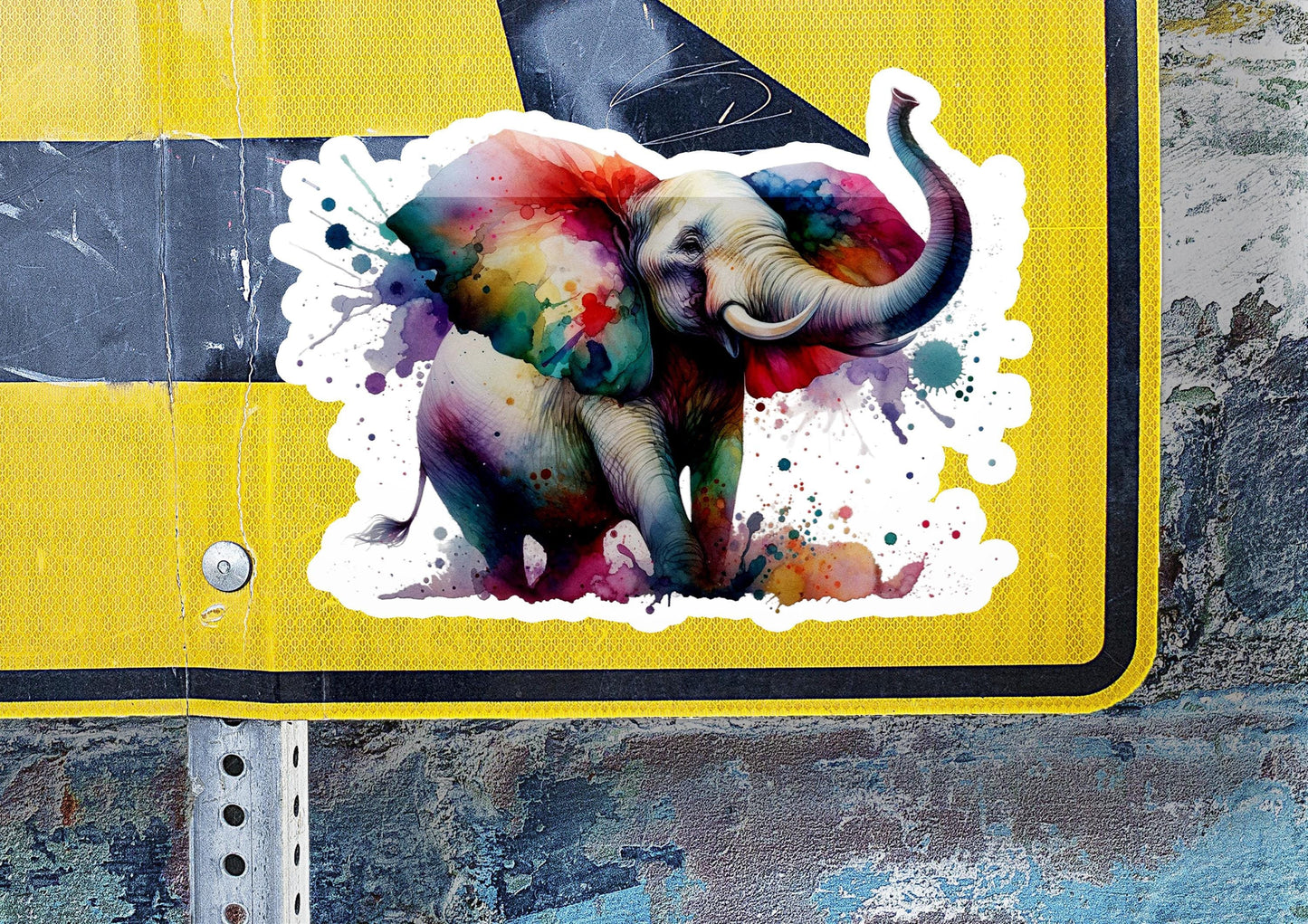 a sticker of an elephant painted on a street sign