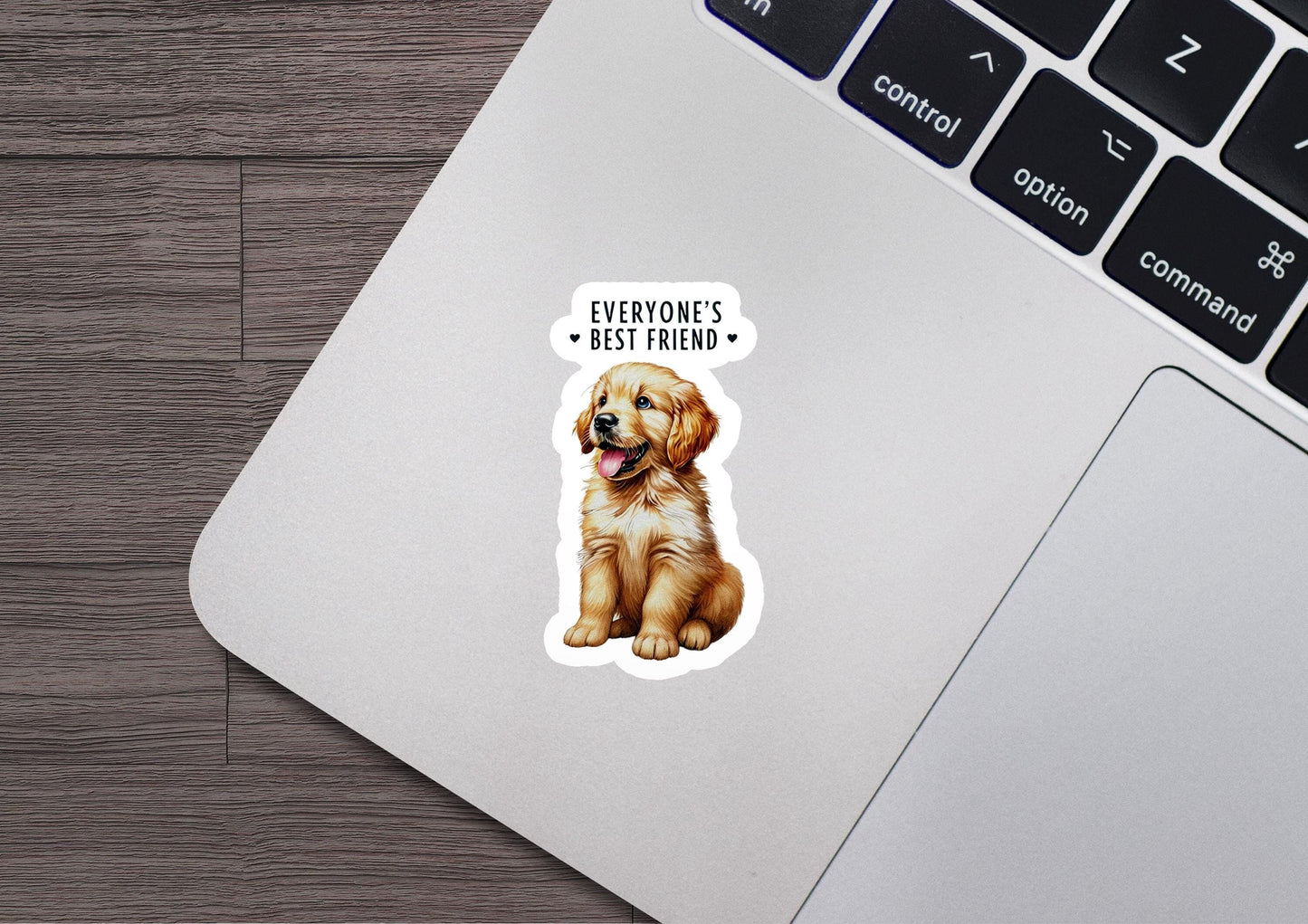 a laptop with a sticker of a dog on it