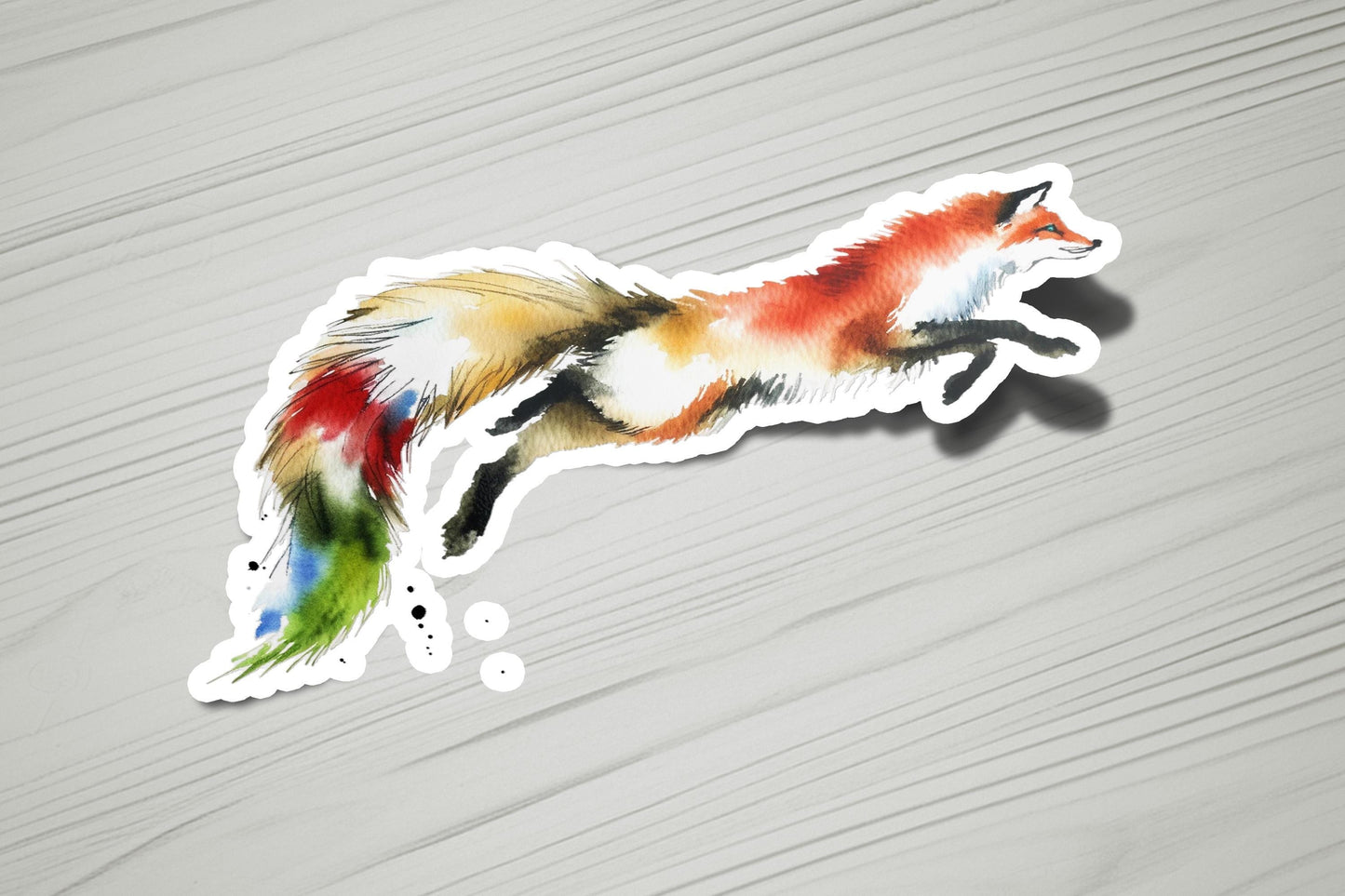 a colorful sticker of a fox on a white background