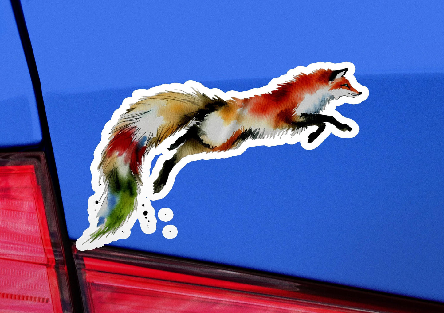 a car with a sticker of a fox on it
