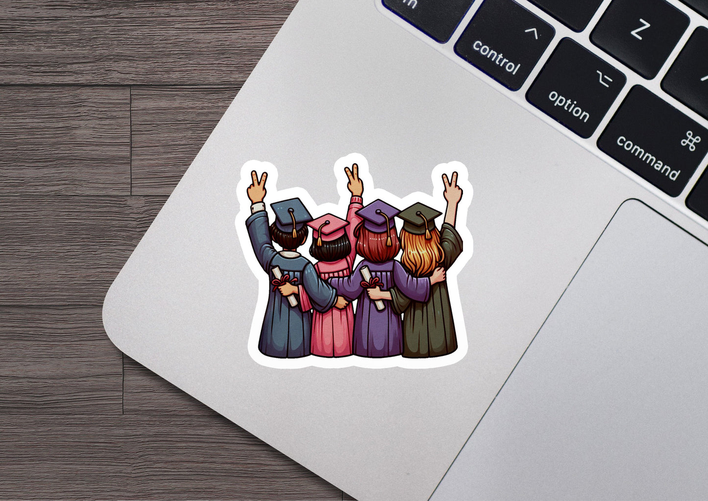 a laptop with a sticker of a group of people on it