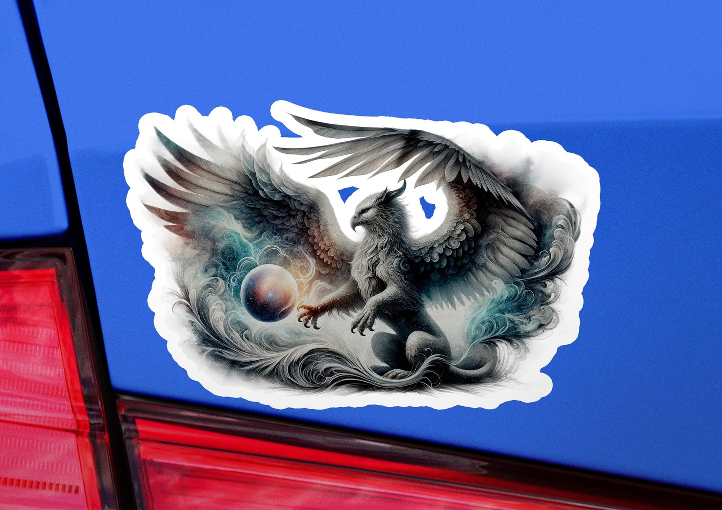 a car with a sticker of a bird on it