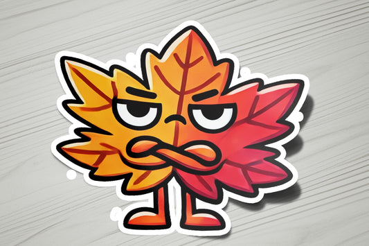a sticker of a leaf with a frowning face