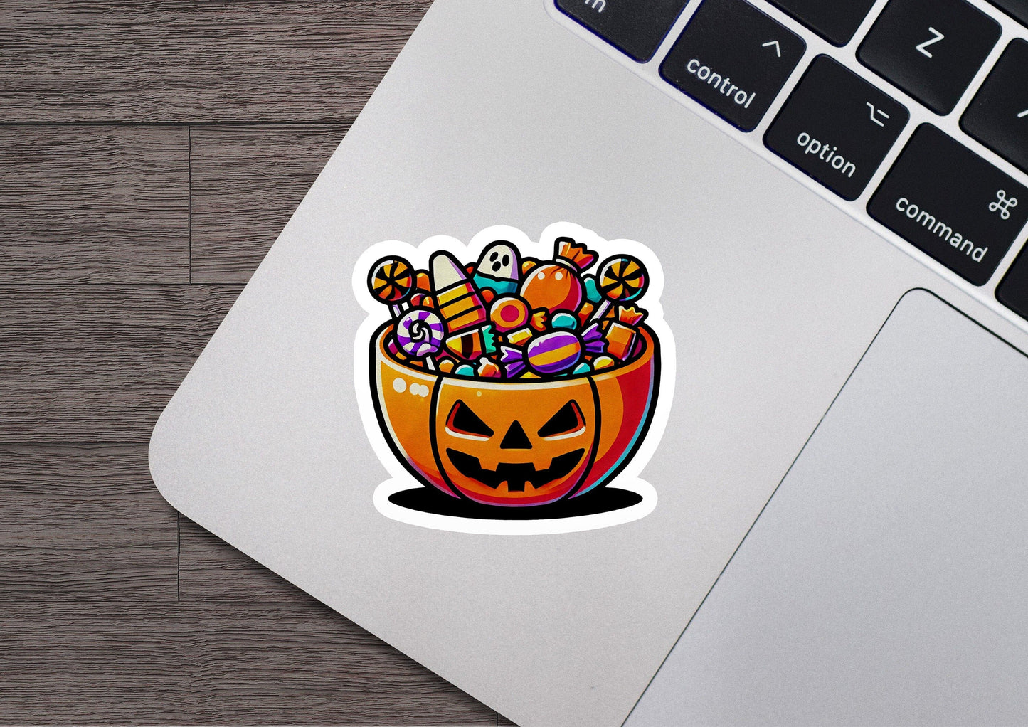 a sticker of a pumpkin filled with candy