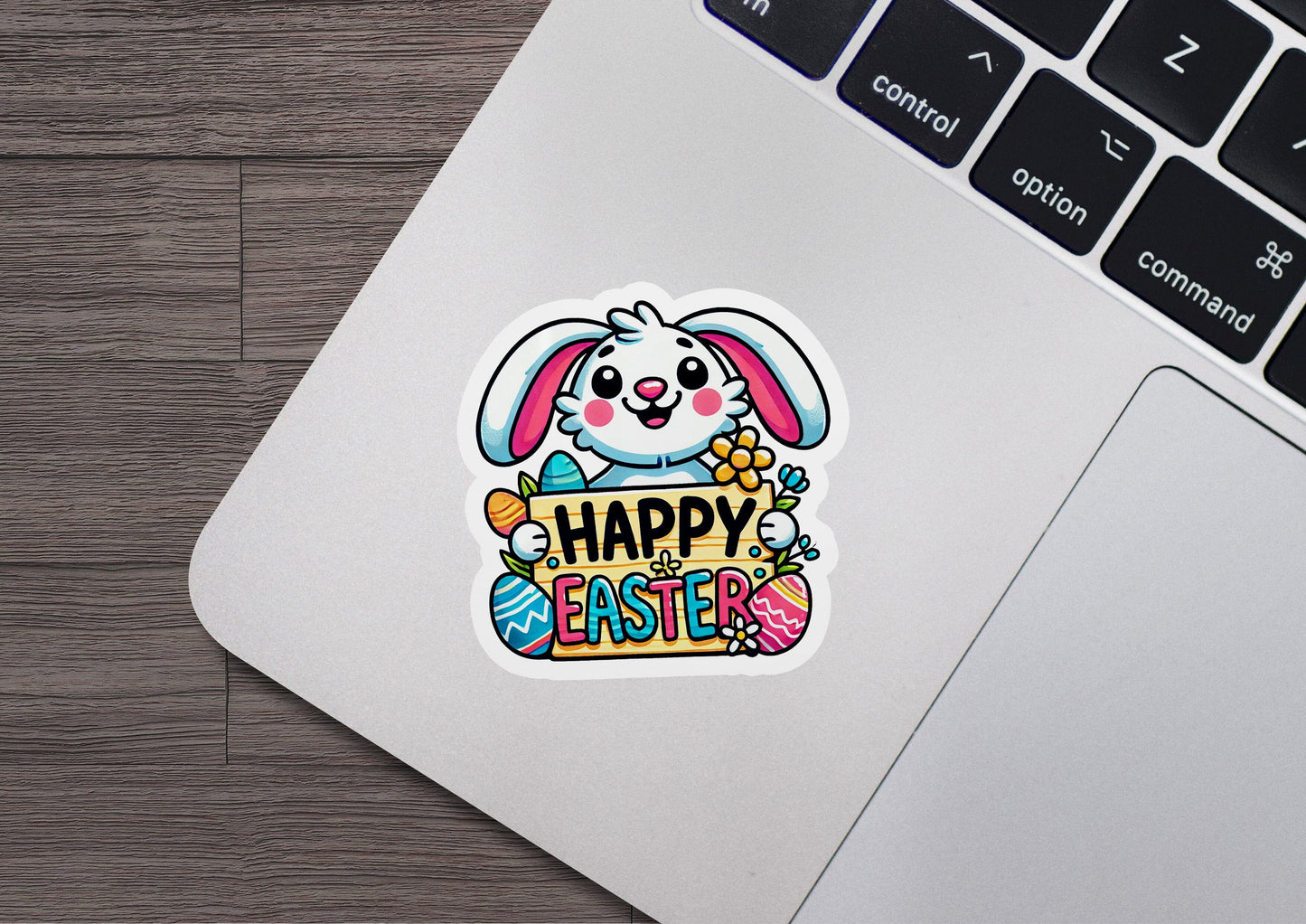 a laptop with a sticker of an easter bunny