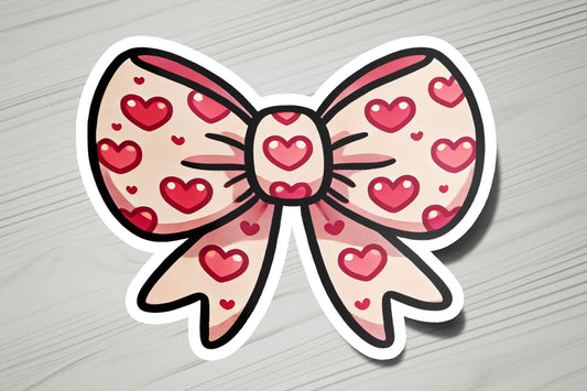 a sticker of a bow with hearts on it