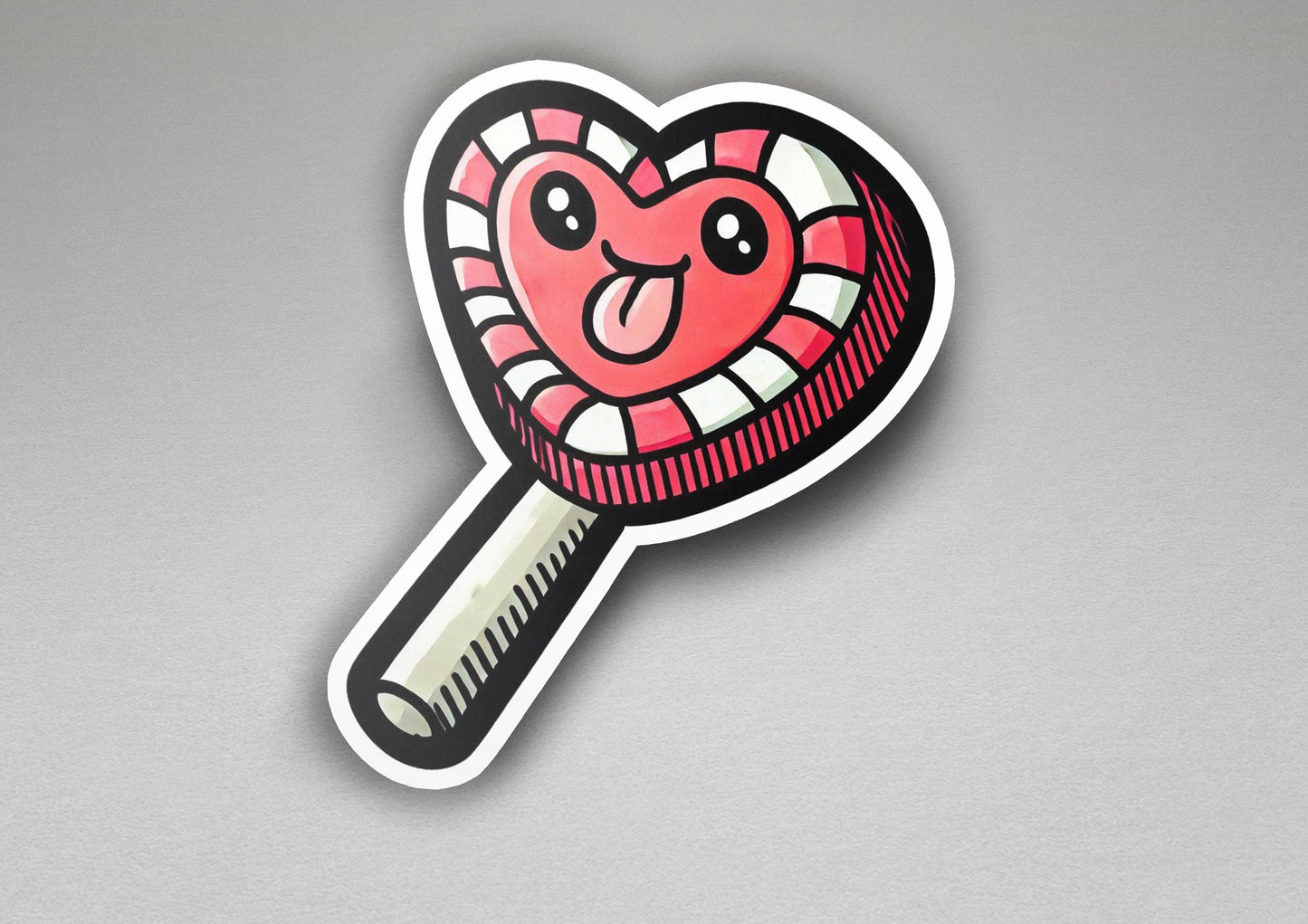 a sticker of a heart - shaped lollipop on a gray background