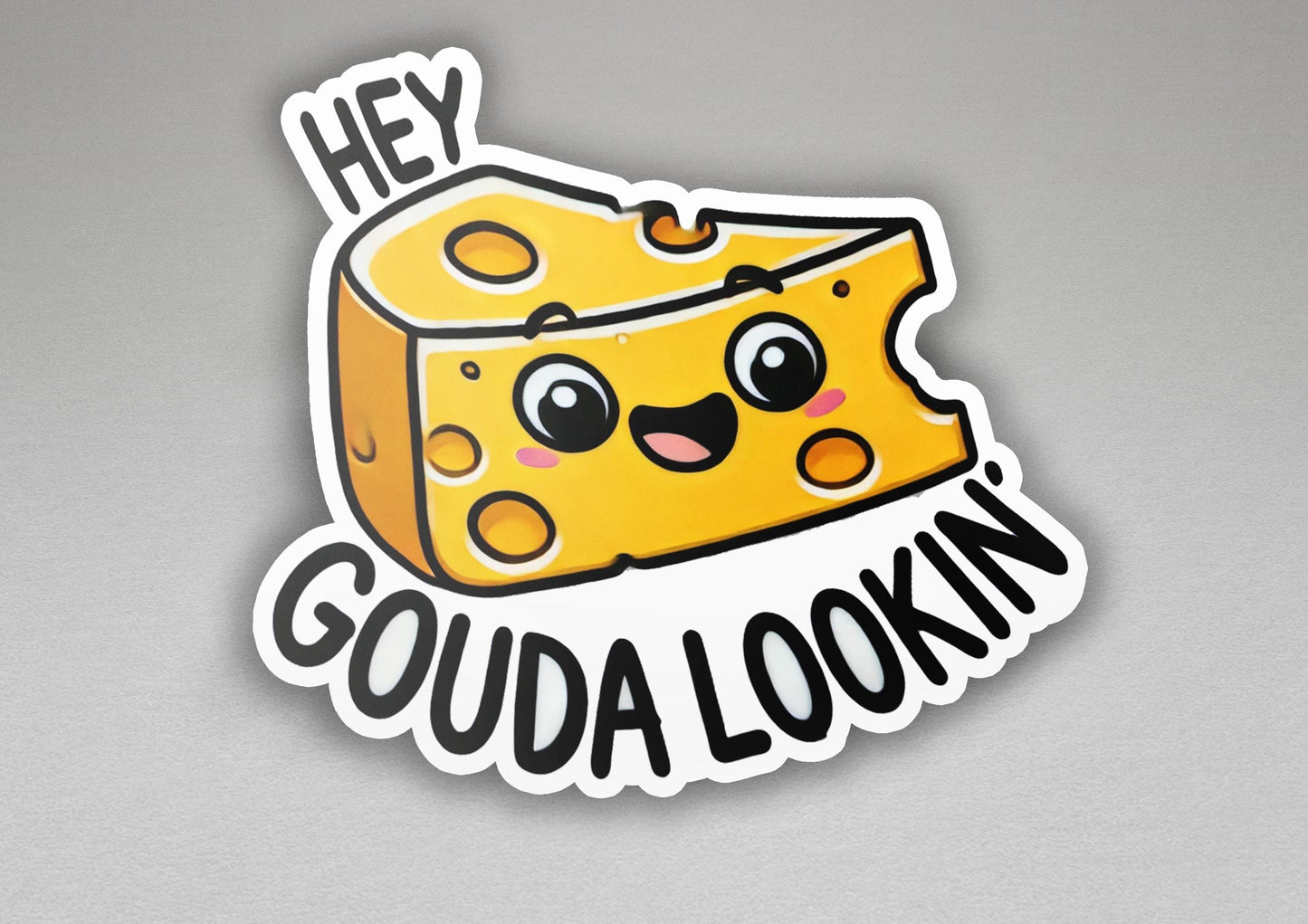 a sticker with a piece of cheese on it