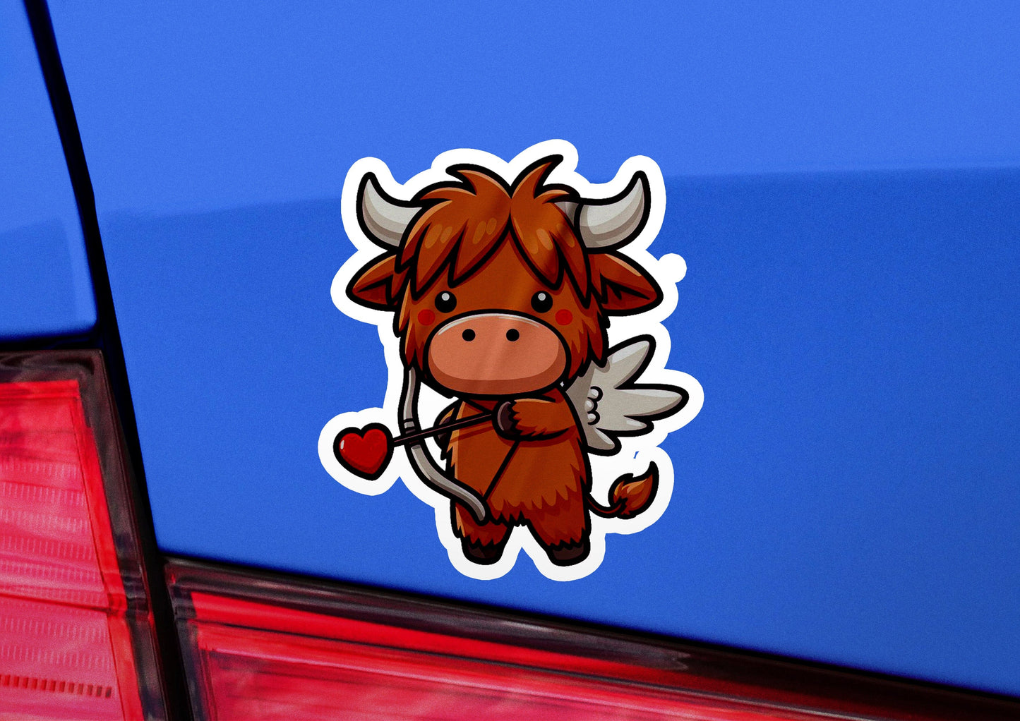 a sticker of a bull with a heart on it's tail
