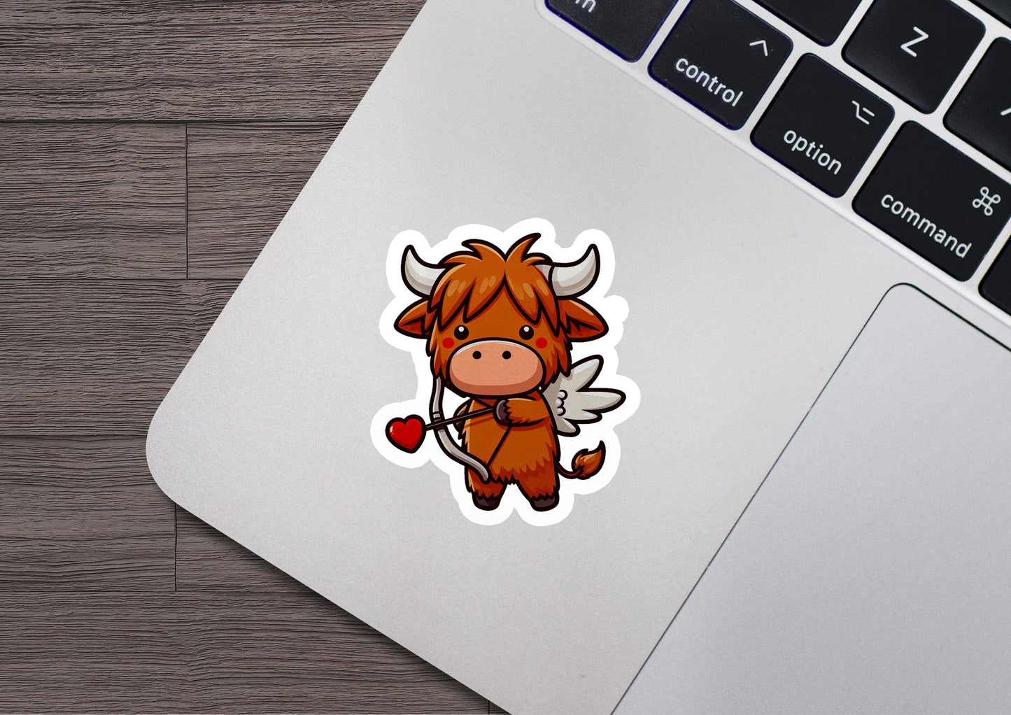a sticker of a bull with a heart on it