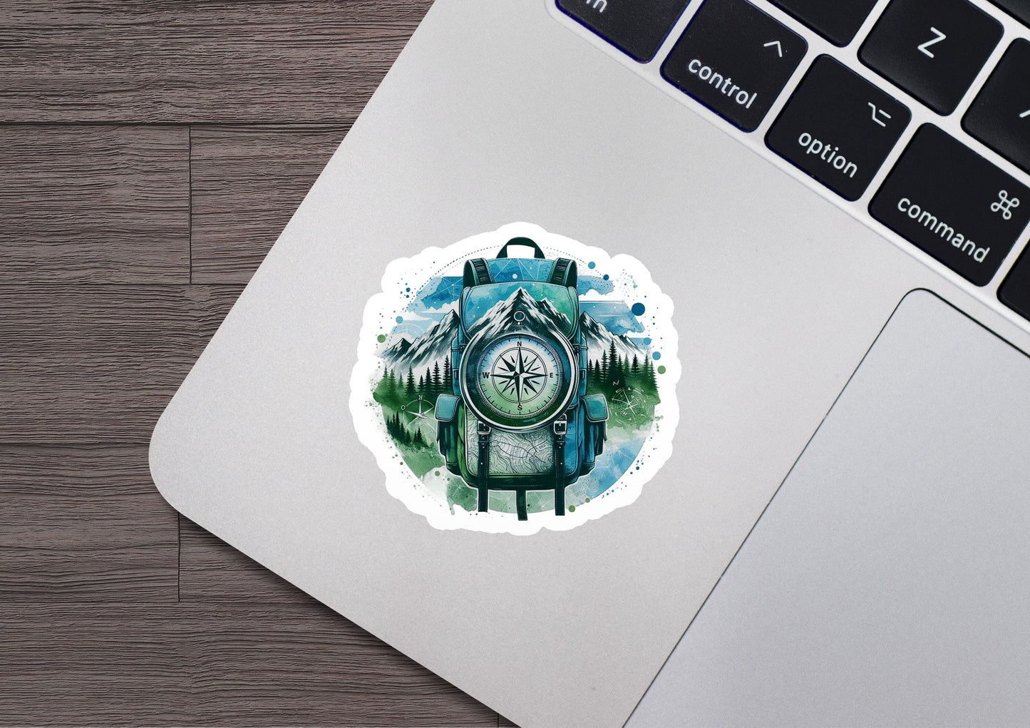 a sticker of a backpack with a compass on it