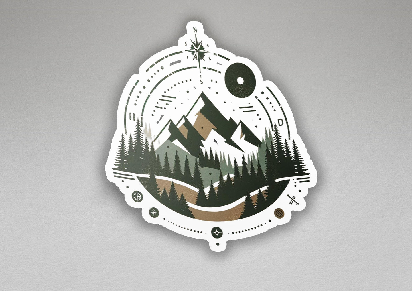 a sticker with a picture of a mountain and trees