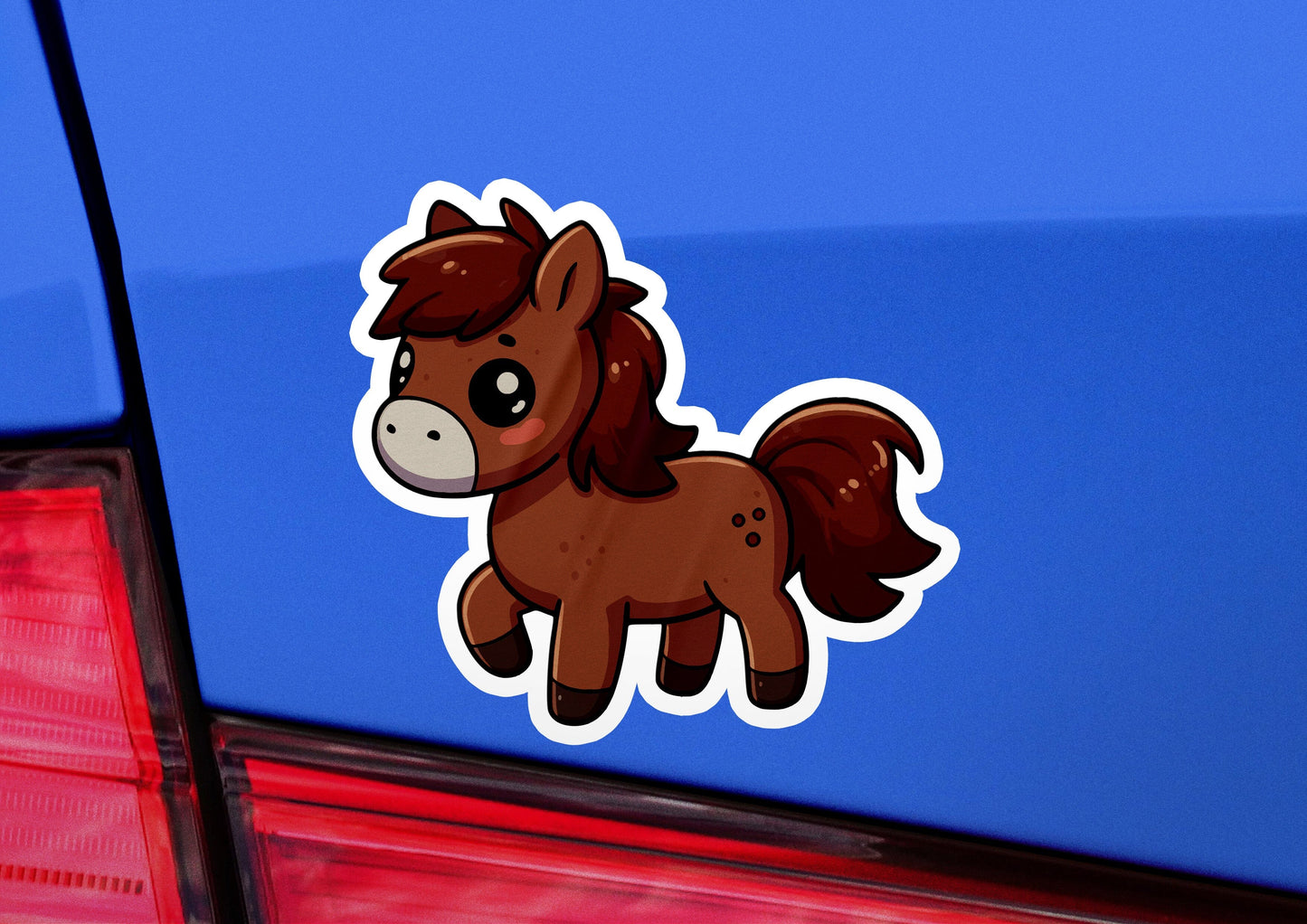 a sticker of a horse on the back of a car