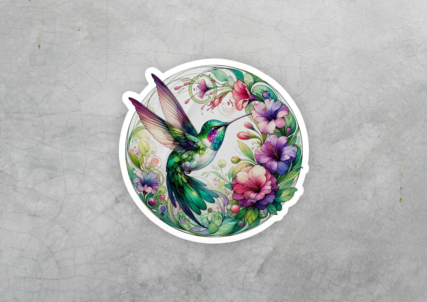a sticker with a hummingbird and flowers on it