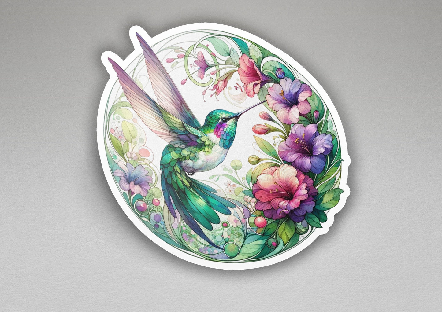 a sticker with a hummingbird and flowers on it