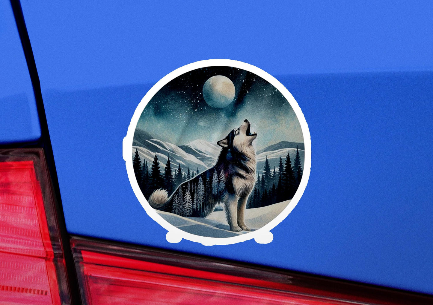 a sticker of a wolf on the back of a car