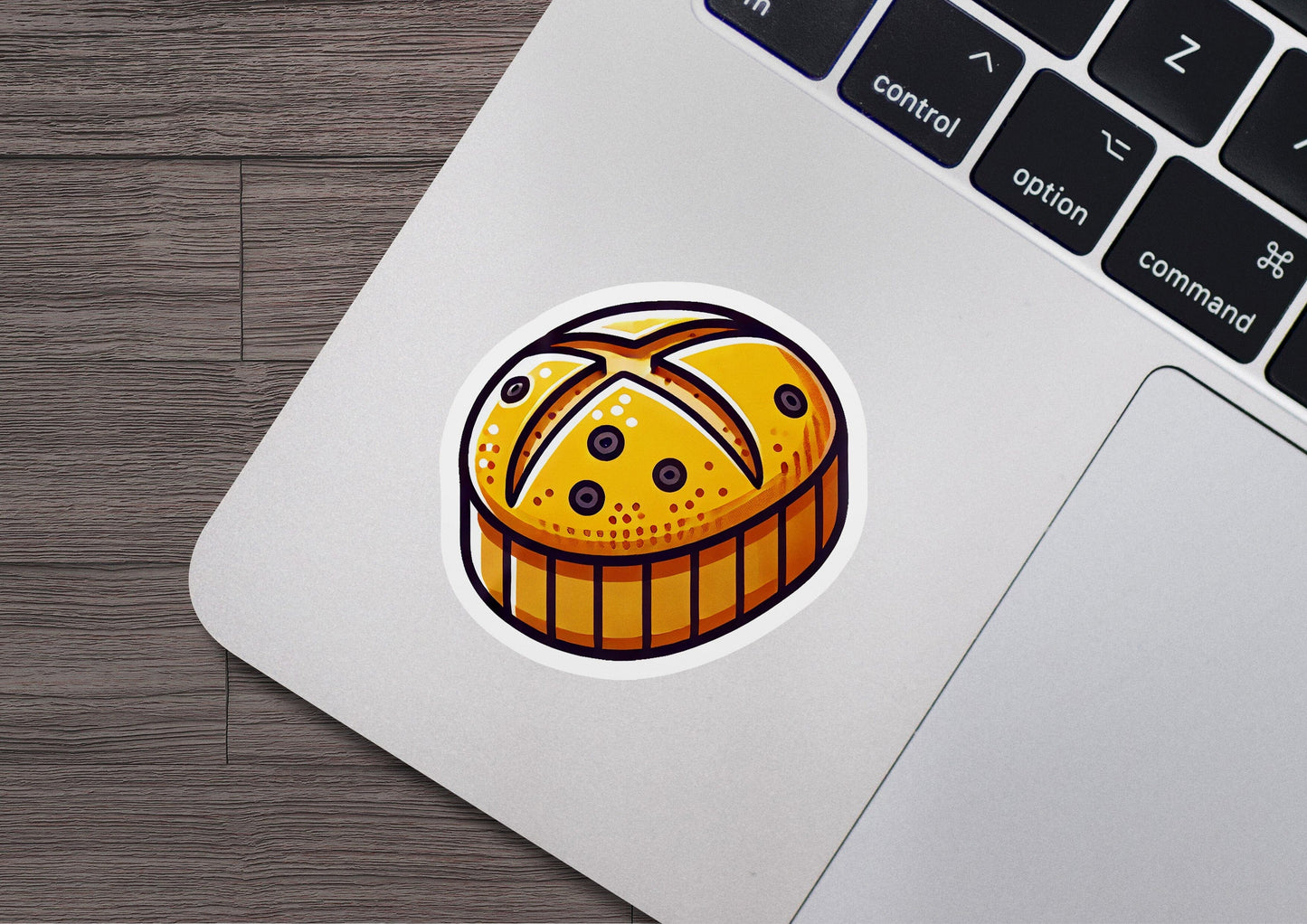 a sticker of a loaf of bread on a laptop