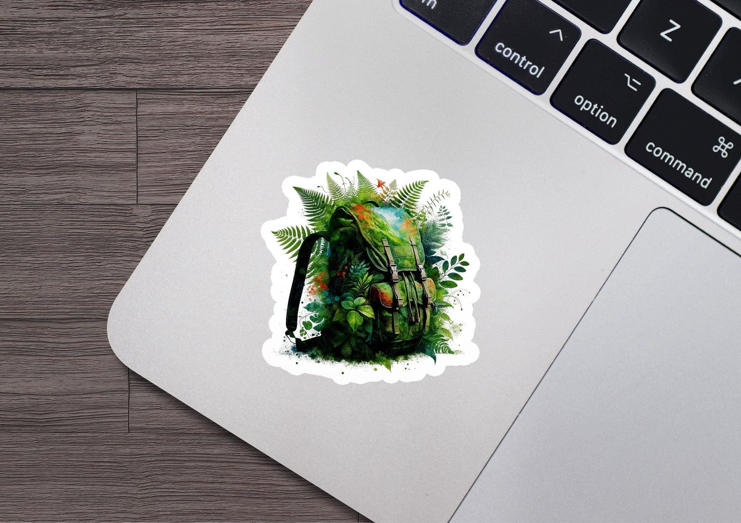 a laptop with a sticker of a backpack on it