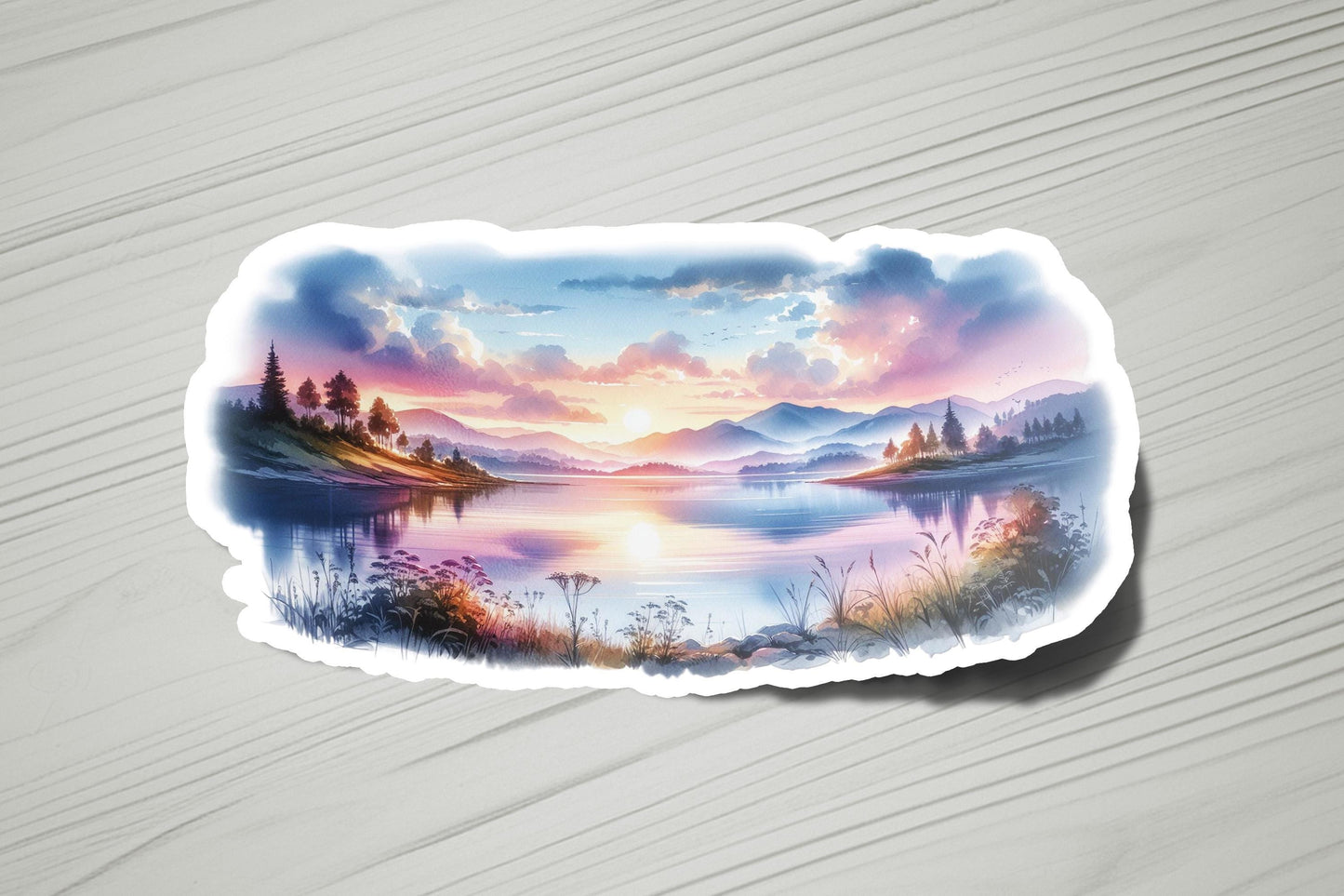 a sticker with a painting of a lake